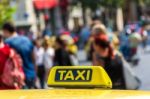 Yellow Taxi Sign On Cab Vehicle Roof Stock Photo