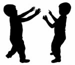 Silhouettes Of Two Little Boys Stock Photo