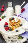 Stack Of Heart Shaped Pancakes With Fresh Berries Stock Photo