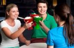 Three Friends Raises Ice Cream Cup Stock Photo