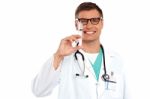 Male Doctor Holding injection Stock Photo