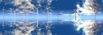 Wind Turbines On A Blue Sky Stock Photo