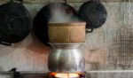 Traditional Culture Cooking Sticky Rice In Thailand And Laos Stock Photo