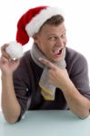 Young Man Wearing Santa Hat Stock Photo