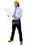 Male Architect With Construction Plan Stock Photo