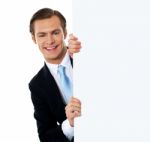 Businessman Holding Blank Board Stock Photo