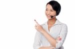 Customer Support Staff Pointing Away Stock Photo