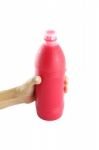 Red Water Bottle In Cover Hand On White Background Stock Photo