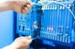 People Fix Core Switch In Network Room Stock Photo