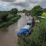 Narrow Boats Moored Along The Shropshire Union Canal Stock Photo