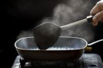 Steam On Pan In Kitchen Stock Photo