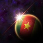 Cameroon Flag On 3d Football With Rising Sun Stock Photo