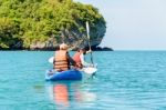 Travel By Boat With A Kayak Stock Photo