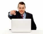 Handsome Male Executive Pointing At You Stock Photo