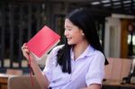 Asia Thai High School Student Uniform Beautiful Girl Read A Book Stock Photo