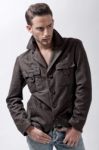 Young Male Model With Brown Jacket Stock Photo