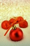 Red Christmas Ball With Bokeh In Merry Metal Tone Stock Photo