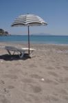 Beach Umbrella And Chair Stock Photo