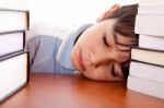 School Boy Sleeping On Table Stock Photo