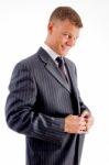 Smiling Manager Buttoning Jacket Stock Photo