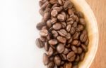 Roasted Coffee Bean In Bowl Stock Photo