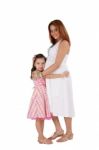 Happy Young Pregnant Woman With Little Daughter. Focus In The Gi Stock Photo