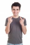 Man With Crossed Fingers Stock Photo