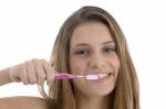 Woman Brushing Her Teeth Stock Photo