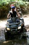 Quadbike Splashing Water Stock Photo