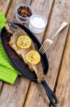 Delicious Baked Rainbow Trout With Lemon Straight From The Oven Stock Photo