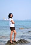 Beautiful Young Asian Woman On Beach Stock Photo