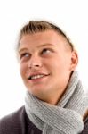 Smiling Young Man Wearing Muffler Stock Photo