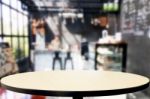 Selected Focus Empty Brown Wooden Table And Coffee Shop Or Resta Stock Photo