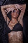 Woman Trapped In Black Fishnet Stock Photo