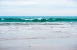 Sand Beach With Blue Ocean Stock Photo