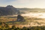 Beautiful Sun Rise Phulangka Mountain And The Mist Stock Photo