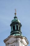 One Of The Towers Of St Nicholas Church In Prague Stock Photo