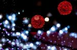 Red Bright Balls With White Foreground Lights Stock Photo