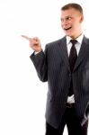 Corner View Of Pointing Businessman Stock Photo