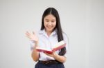 Asia Thai High School Student Uniform Beautiful Girl Read A Book Stock Photo