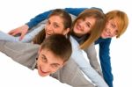 Smiling Teenagers Laying Stock Photo