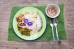 Top View Thai Traditional Spicy Fried Rice With Chili Paste,fried  Mackerel,crispy Pork  And Local Vegetable On Banana Leaf Stock Photo