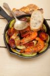 Roasted Shrimps With Zucchini And Tomatoes Stock Photo