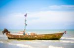 Wooden Boat On Water Stock Photo