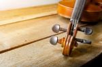 The Violin On The Table, Close Up Of Violin On The Wooden Floor Stock Photo