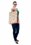 Lady Standing With Shopping Bag Stock Photo