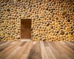 Stone Wall With Door And Wood Floor In Front Off Stock Photo