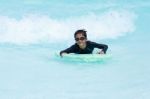 Boy Play In Clear Water Stock Photo