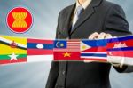 Asean Economic Community In Businessman Hand Stock Photo