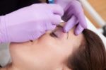 A Woman Getting Permanent Make Up Stock Photo